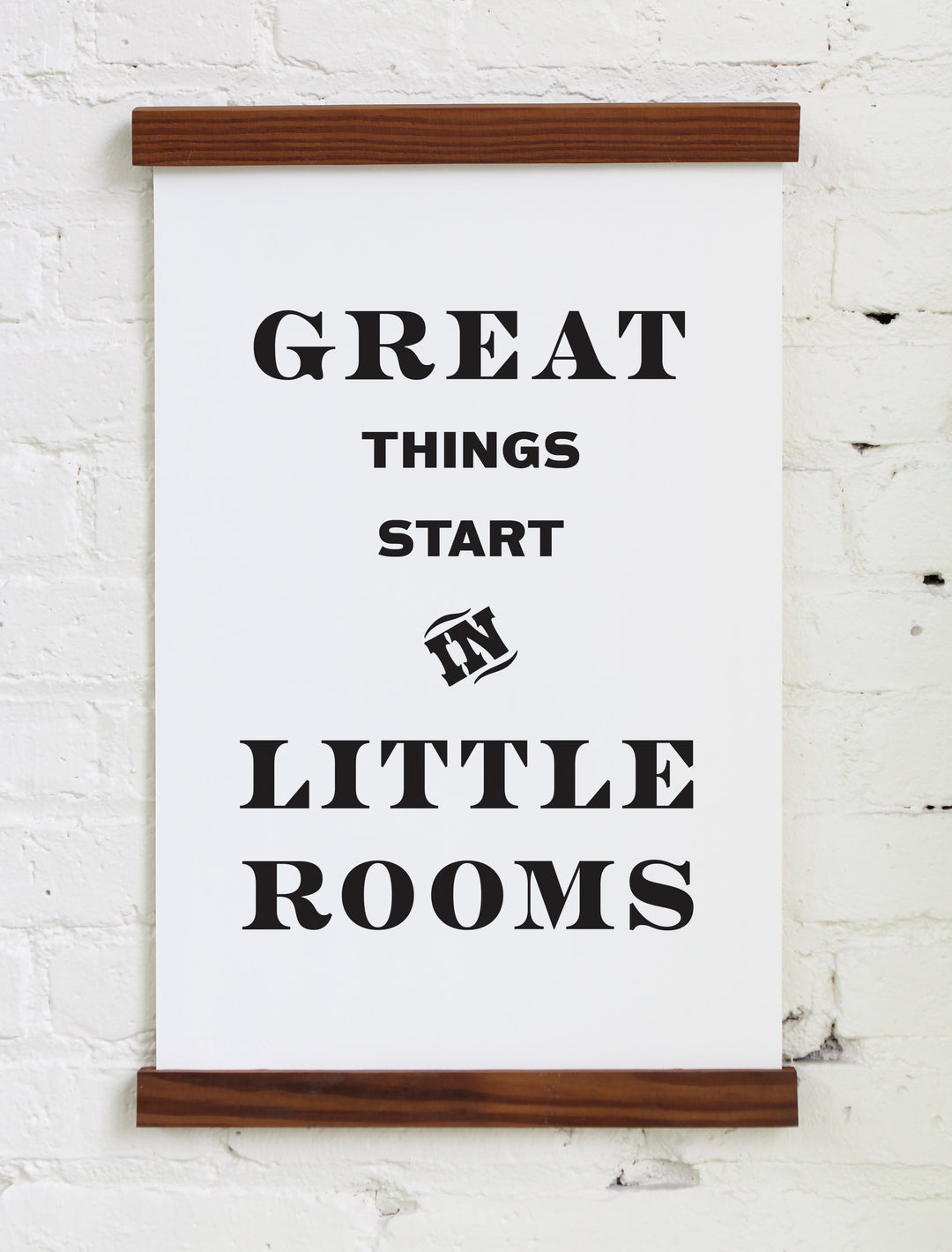 Motivational poster with 'Great things start in little rooms' text on a white background